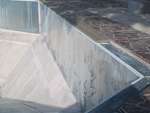 Quasai paver deck with pressure treated wood coping edging