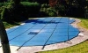 Merlin 14' x 28' Solid Safety Cover w/ Drain Panel | 4' x 8' Center End Step | Green | 106W-X-GR