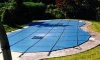 Merlin 16' x 32' Solid Safety Cover w/ Drain Panel | 4' x 8' 1' or 2' Offset Right Step Section | Green | 25W-X-GR