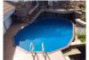 Ultimate 17' x 32' Oval Above Ground Pool Kit | Brown Synthetic Wood Coping | Free Shipping | Lifetime Warranty | 61015