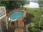 Ultimate 15' x 30' Oval On Ground Pool Kit | Brown Synthetic Wood Coping | Walk-In Step | Free Shipping | Lifetime Warranty | 61082