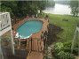 Ultimate 17' x 32' Oval On Ground Pool Kit | Brown Synthetic Wood Coping | Walk-In Step | Free Shipping | Lifetime Warranty | 61083